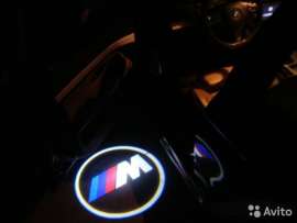 Проекция логотипа BMW М